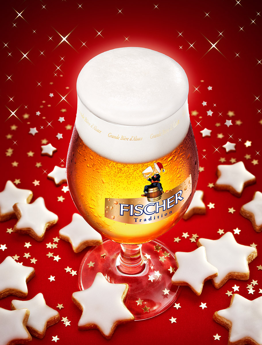 Campagne publicitaire bière Fischer Tradition, biscuits de Noël en forme d'étoiles